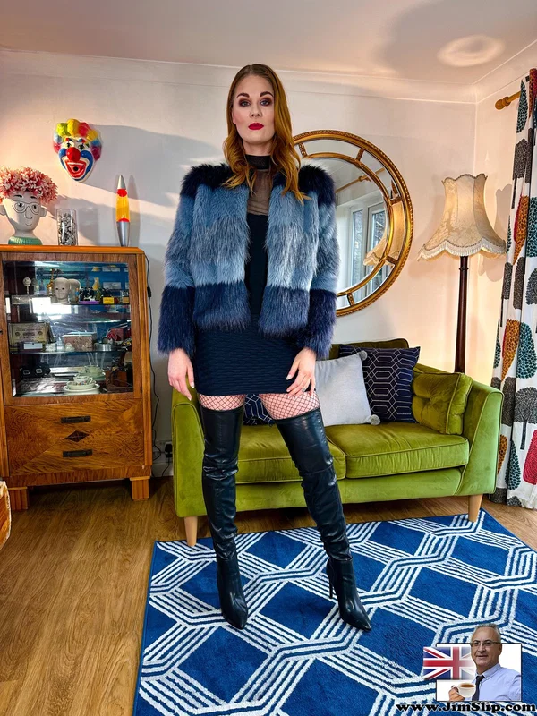 Sexy redhead models a fur coat and black miniskirt in thigh-high boots  - Leather, Redhead, Stockings, Clothed, Upskirt, High Heels, Skirt, Amateur, Beautiful, Non Nude  - Photo 1