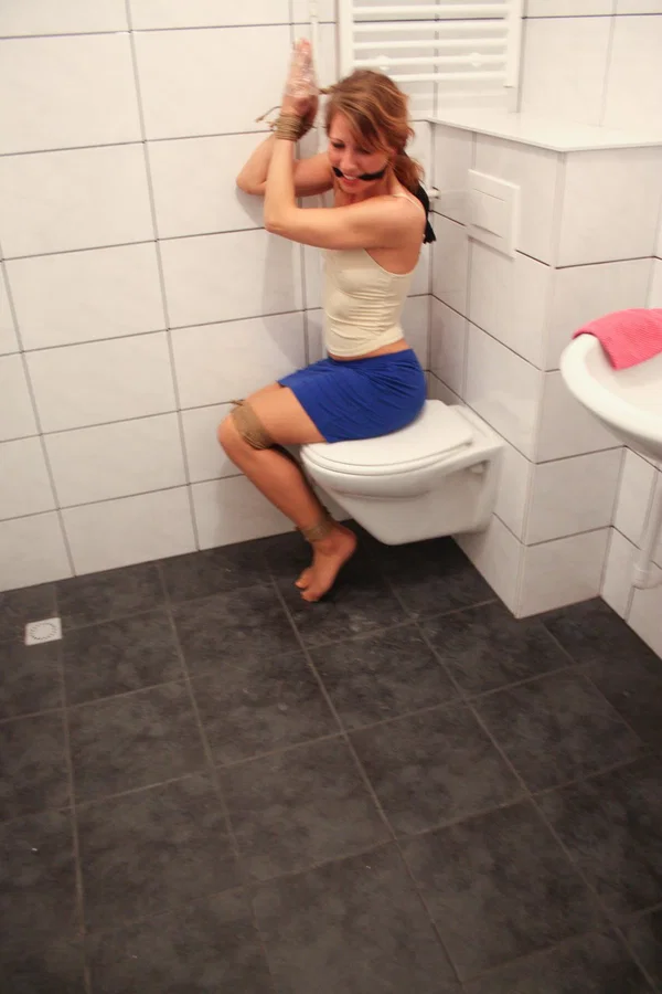Brunette babe Eve struggles to free herself from bondage in the bathroom  - Clothed, Bondage, BDSM, Skirt, Redhead, Amateur, Babe, Ass, Blowjob, Feet  - Photo 7