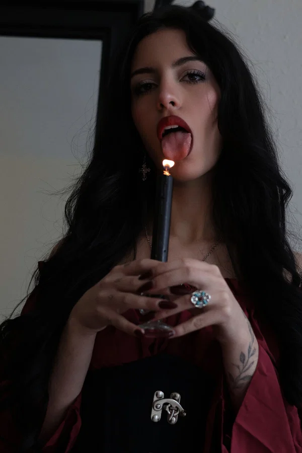 Goth girl Kore Fox blows out a candle before lighting one on her tongue  - Goth, Spanish, Fetish, Skirt, Close Up, Nipples, Pornstar, Skinny, Babe, Beautiful  - Photo 5