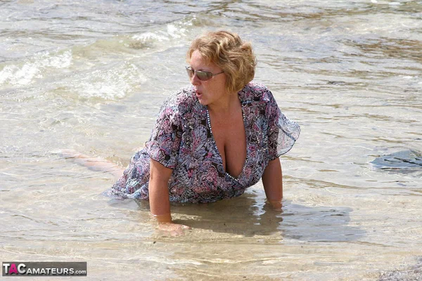 Fat mature lady Curvy Claire exposes her huge tits while kneeling in the ocean  - Mature, Beach, BBW, Chubby, Glasses, Amateur, MILF, Outdoor, Wet, Big Tits  - Photo 4