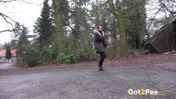 White girl Cynthia Vellons squats to take a piss next to an isolated building  - Pissing, Public, MILF, Boots, Spreading, Pussy, Outdoor, Czech, Close Up, Shaved  - Photo 2
