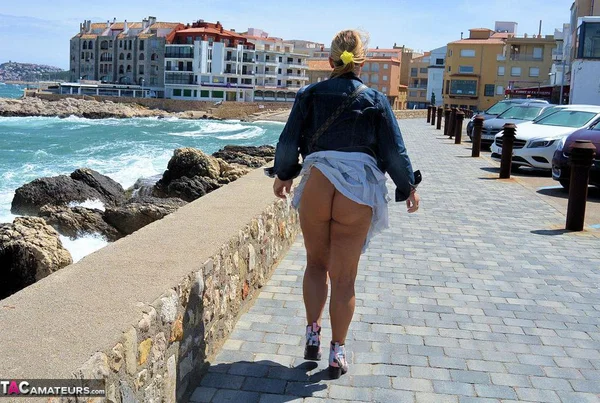 Mature fatty Chrissy walks by the sea with her round big tits bared  - Mature, Beach, BBW, Glasses, Amateur, Outdoor, Chubby, Blonde, MILF, European  - Photo 11
