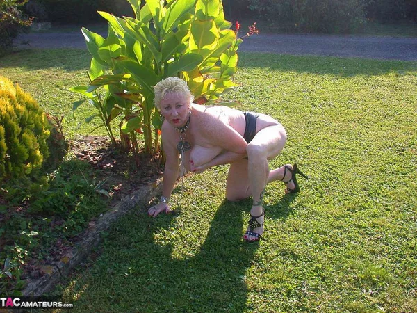 Busty older blonde Mary Bitch goes topless in a yard in crotchless underwear  - Mature, Short Hair, Amateur, Leather, Big Tits, Outdoor, Natural Tits, High Heels, PAWG, Ass  - Photo 19