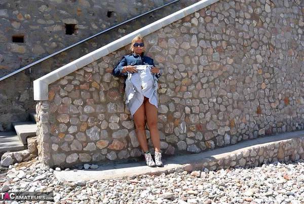 Mature fatty Chrissy walks by the sea with her round big tits bared  - Mature, Beach, BBW, Glasses, Amateur, Outdoor, Chubby, Blonde, MILF, European  - Photo 17