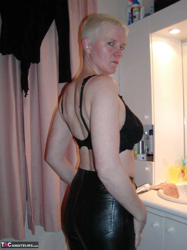 Older blonde woman Tiffany Pearl gets dressed after taking a bath  - Mature, Short Hair, Bath, Saggy Tits, Lingerie, Natural Tits, Leather, Big Tits, Tattoo, Panties  - Photo 15