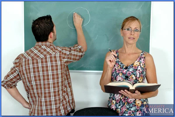 Mature teacher in glasses Nicole Moore pleasuring cock with her boobs  - Teacher, Mature, Glasses, Facial, Hardcore, Big Tits, Cumshot, Pussy Licking, Reality, Cowgirl  - Photo 1