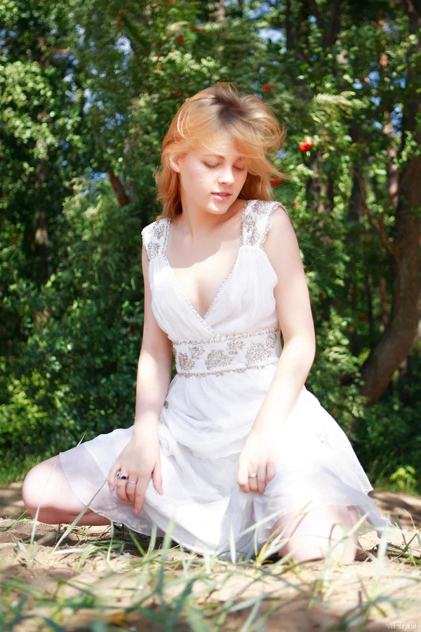 Pretty teen girl removes a white dress to get naked in a sunlit forest area  - Outdoor, Teen, Babe, Skinny, Beautiful, Cute, Model, Glamour, Skirt, Shaved  - Photo 3