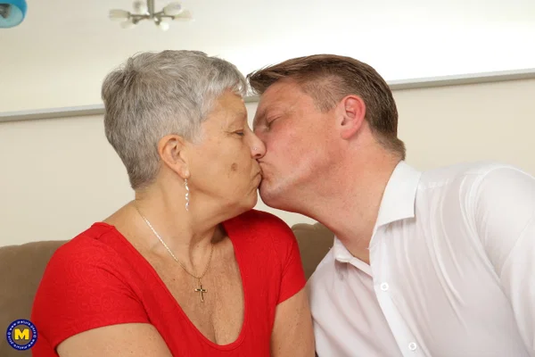 Old British woman and her lover undress before fucking on a couch  - Granny, Clothed, Chubby, Blonde, Curvy, Saggy Tits, BBW, Reality, Kissing, Thick  - Photo 8