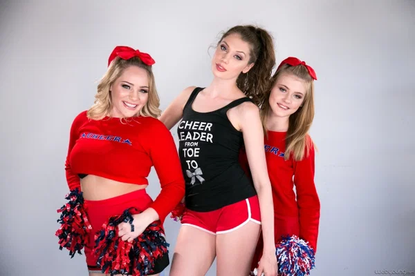 3 cheerleaders discovers the joys of lesbian sex on a white couch  - Cheerleader, Lesbian, Teen, Reality, Kissing, Pussy Licking, Pornstar, Socks, Clothed, Brunette  - Photo 2