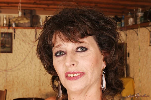 Stunning brunette granny on high heels slipping off her dress and panties  - Granny, Big Tits, Pussy, Legs, Spreading, Ass, Hairy, Panties, Short Hair, High Heels  - Photo 6