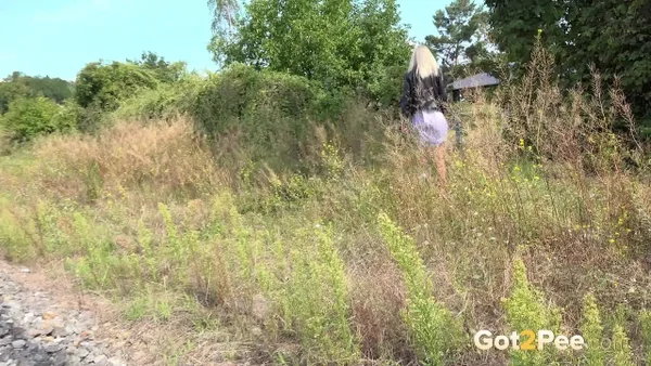 Blonde chick Debora shows her shaved pussy while peeing beside railway tracks  - Public, Pissing, Pussy, Fetish, Glasses, Leather, Outdoor, Panties, Shaved, Spreading  - Photo 15