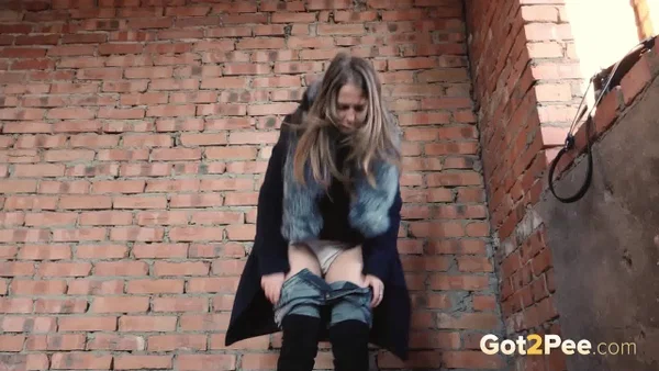 Distressed girl squats for an outdoor piss while wearing a heavy winter coat  - Pissing, Boots, Jeans, Outdoor, Pussy, Non Nude, Undressing, Babe, Beautiful, Solo  - Photo 10