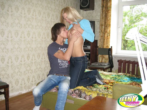 Blonde teen and her boyfriend kiss before disrobing to fuck on a bed  - Seduction, Jeans, Teen, Reality, Undressing, Piercing, Blowjob, Hardcore, Kissing, Clothed  - Photo 4