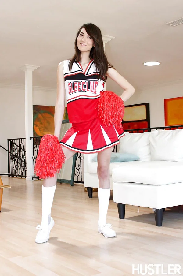 Naughty teen girl Emily Grey posing solo in sexy cheerleader uniform  - Cheerleader, Teen, Skinny, Pornstar, Socks, Babe, Ass, Clothed, Skirt, Upskirt  - Photo 3