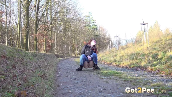 White girl Amanda Hill pulls down her jeans to pee on a gravel road  - Pissing, Public, Jeans, Pussy, Close Up, Redhead, Hairy, Outdoor, Czech, Spreading  - Photo 3