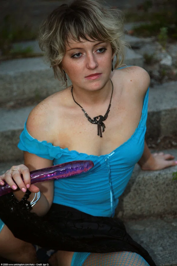 Blonde girl masturbates with a sex toy on the steps of a building  - Hairy, Amateur, Teen, Beautiful, Blonde, Solo, Cute, Babe, White  - Photo 1