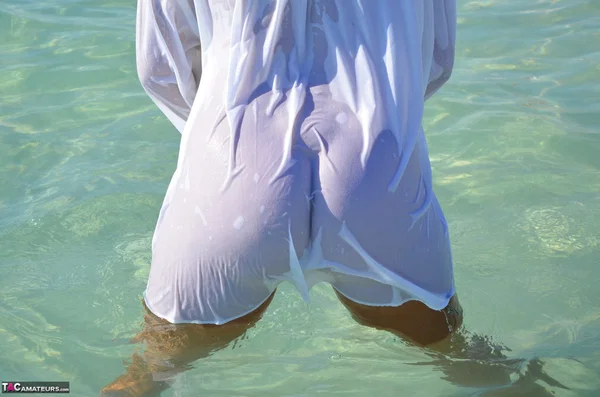 Blonde amateur Sweet Susi steps into the ocean while naked in a white shirt  - Beach, Mature, MILF, Chubby, Thick, Amateur, BBW, Curvy, Big Tits, Outdoor  - Photo 14
