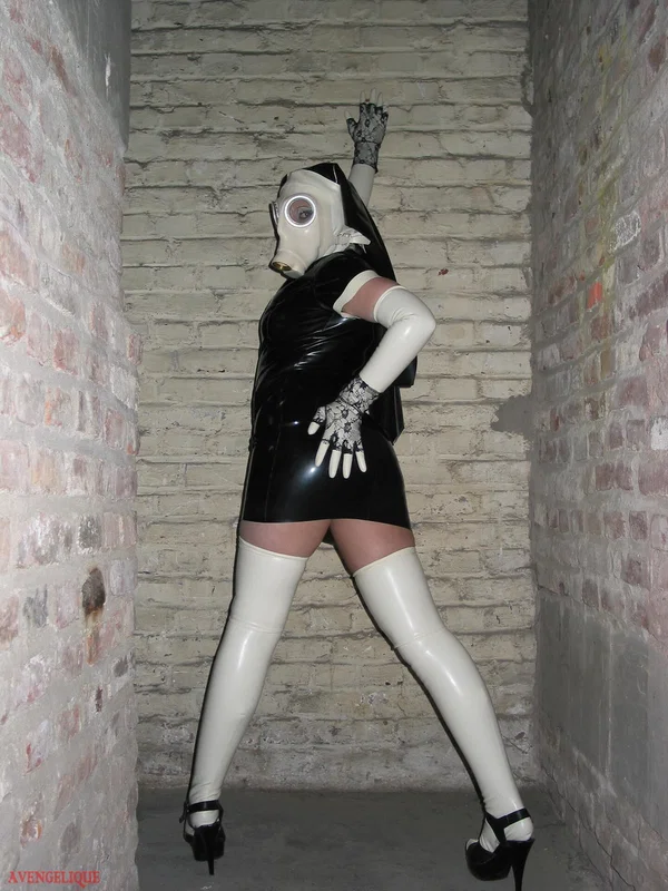 Solo model Avengelique sports a gas mask while wearing latex Nun clothing  - Nun, Latex, Skirt, Fetish, Uniform, Stockings, Clothed, High Heels, PAWG, Legs  - Photo 8