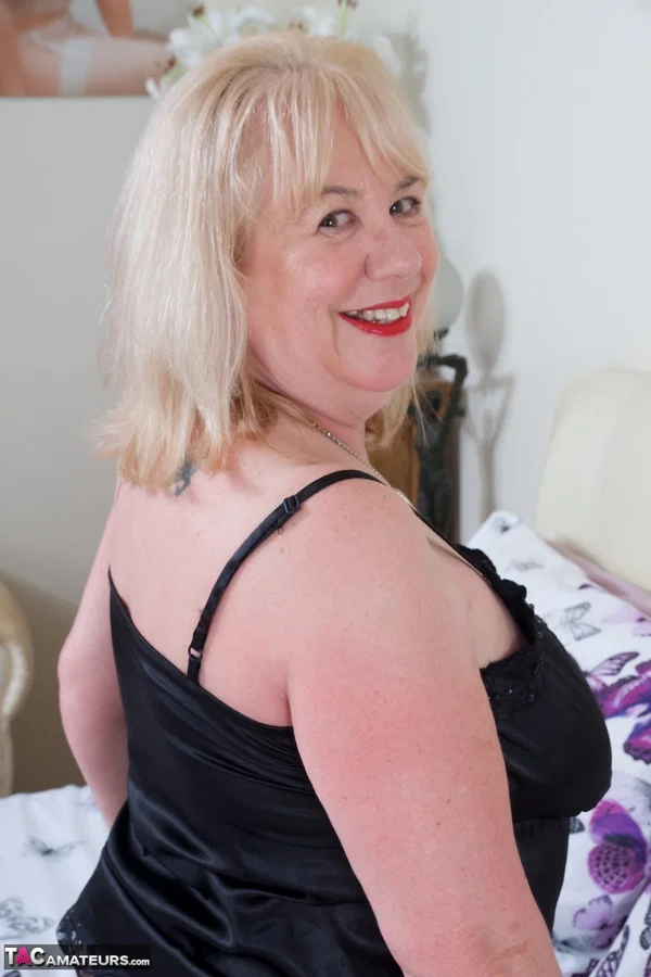 Mature UK fatty Speedy Bee doffs black negligee on a bed in back seam nylons  - Mature, Chubby, Saggy Tits, Curvy, Lingerie, BBW, Amateur, Thick, Blonde, Natural Tits  - Photo 4