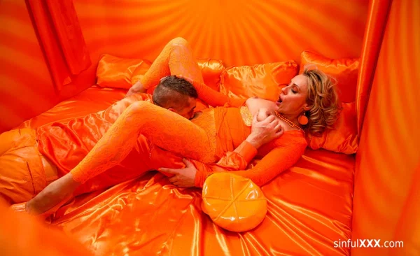 Blonde MILF Brittany Bardot takes a boner deeply in an all-orange environment  - Petite, Fetish, Blonde, White  - Photo 15