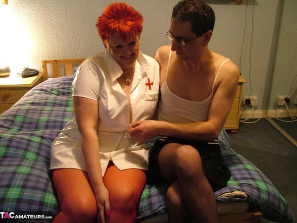 Mature nurse with red hair Valgasmic Exposed indulges in foreplay with a sissy  - Nurse, Mature, Chubby, Latex, BBW, Curvy, Amateur, Thick, Boots, Redhead  - Photo 3