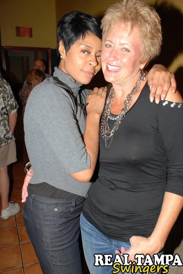 Mature lady Tracy Lick introduces her swinging friends at a party  - Swingers, Mature, Party, Granny, Clothed, Interracial, Ass, Big Tits, Skirt, Panties  - Photo 1