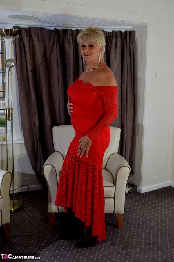 Older lady with short blonde hair Dimonty slips off a long red dress  - Mature, Clothed, Short Hair, Amateur, High Heels, Blonde, Undressing, Stockings, Lingerie, Legs  - Photo 9