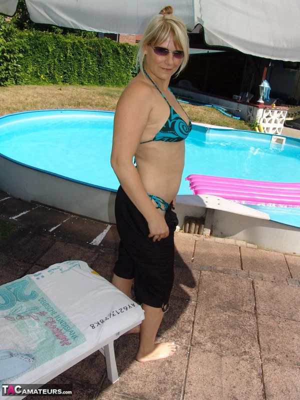 Blonde amateur Sweet Susi removes her bikini to skinny dip in a swimming pool  - Mature, Pool, MILF, Amateur, Outdoor, PAWG, Blonde, European, Pussy, Bikini  - Photo 2