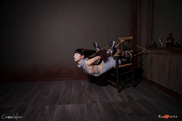Solo girl Carmineworx is tied to a chair in a highly uncomfortable position  - BDSM, Clothed, Bondage, Stockings, High Heels, Nipples, Ass, Tattoo, Skirt, PAWG  - Photo 12