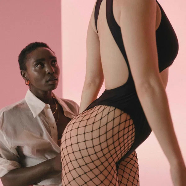 Short haired ebony Zaawaadi and curly haired Nina Exotika play with a strapon  - MILF, Ebony, Natural Tits, Interracial, Strapon, Pantyhose, African, Black, Lesbian, Close Up  - Photo 7