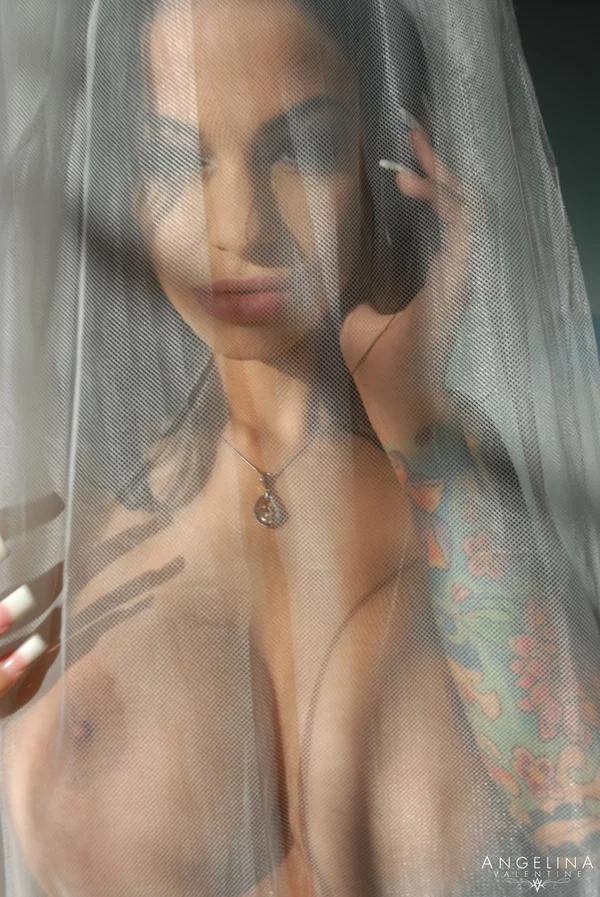 Latina Angelina Valentine talks on the phone as she poses behind the curtain  - Pornstar, Latina, Sexy, Brunette  - Photo 3