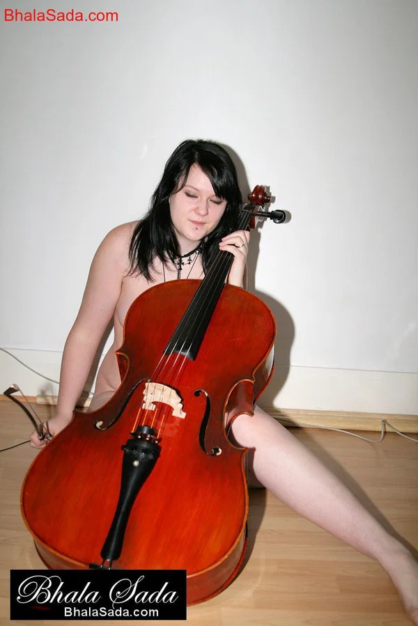 Raven-haired MILF Bhala Sada sitting in a chair playing the cello in the nude  - MILF, Non Nude, Beautiful, Brunette, Babe, Solo  - Photo 15