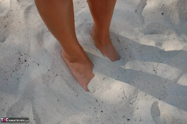 Mature woman Sweet Susi models totally naked on a patch of sand in a backyard  - Mature, Beach, Outdoor, MILF, Big Tits, Amateur, Feet, Ass, Close Up, Spreading  - Photo 19