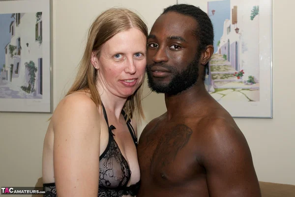 White amateur deepthroats her black lover's cock in lingerie ensemble  - Interracial, Mature, Amateur, Blonde, Stockings, Ball Licking, Shaved, Blowjob, Fingering, Cumshot  - Photo 1