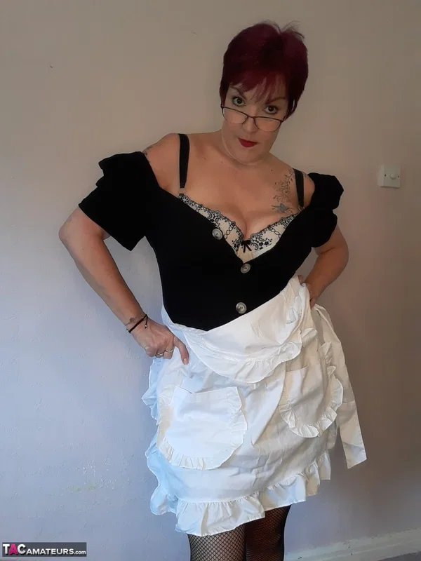 Older maid with short red hair Layla Bird toys her shaved pussy while at work  - Mature, Maid, BBW, Curvy, Chubby, Saggy Tits, Redhead, Short Hair, Stockings, Big Tits  - Photo 16
