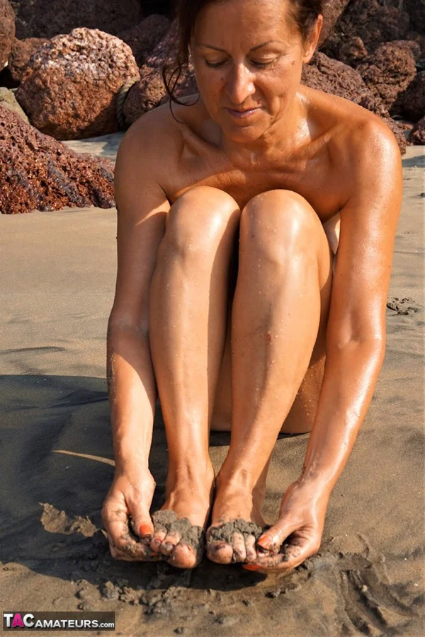 Naked older woman Diana Ananta covers her feet in beach sand at low tide  - Beach, Cougar, Mature, Amateur, Outdoor, Saggy Tits, Feet, Spreading, Pussy, Brunette  - Photo 7