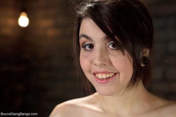 Black haired teen Tegan Tate gets gangbanged by several horny inmates  - Prison, Cosplay, Gangbang, Blowbang, Petite, Bondage, BDSM, Brunette, Skinny, Short Hair  - Photo 1