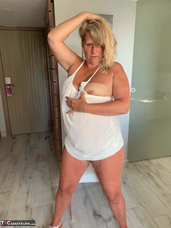 Thick older woman Sweet Susi exposes tan lined tits after hiking up her dress  - BBW, Mature, Chubby, Thick, Saggy Tits, MILF, Curvy, Amateur, Clothed, Spreading  - Photo 19