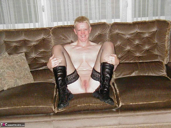 Mature blonde Tiffany Pearl gets naked on a sofa in stockings and black boots  - Mature, Saggy Tits, Chubby, Short Hair, Amateur, Curvy, Boots, BBW, Leather, Thick  - Photo 10