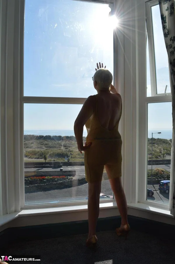 Big titted older woman Barby Slut showcases her bald twat in front of a window  - Mature, Glasses, BBW, Skirt, Thick, Chubby, Curvy, Short Hair, Legs, Spreading  - Photo 3