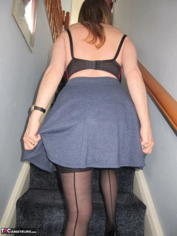 Mature woman slides panties aside after upskirt flashing on stairs  - BBW, Mature, Chubby, Spreading, Stockings, Amateur, Redhead, Thick, British, Pussy  - Photo 6