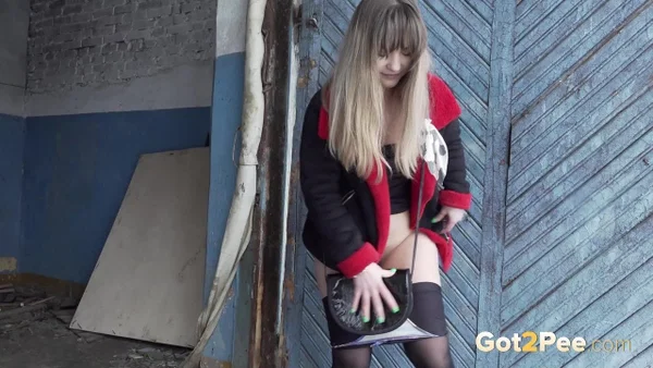 Blonde girl Veronica takes a pee in nylons up against a wooden door  - Pissing, Public, Pantyhose, Outdoor, Close Up, Pussy, Panties, Shaved, Skirt, Blonde  - Photo 3