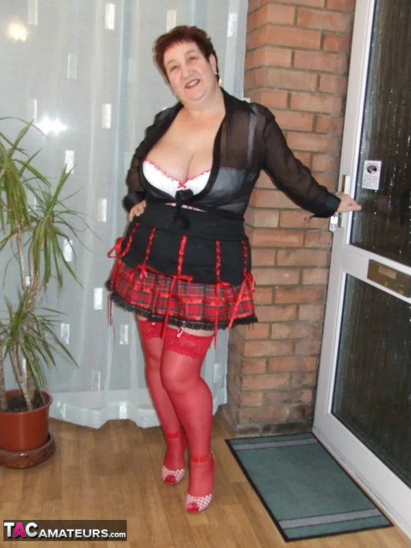 Fat amateur with short hair Kinky Carol exposes her huge tits in red nylons  - SSBBW, BBW, Mature, Saggy Tits, Pussy, Curvy, Chubby, Stockings, Thick, Hairy  - Photo 1