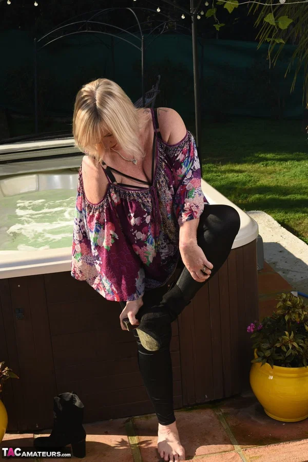 Fat older blonde Melody peels off black leggings afore an outdoor hot tub  - Mature, BBW, Curvy, Thick, Yoga Pants, Pool, Chubby, Amateur, Outdoor, Non Nude  - Photo 9