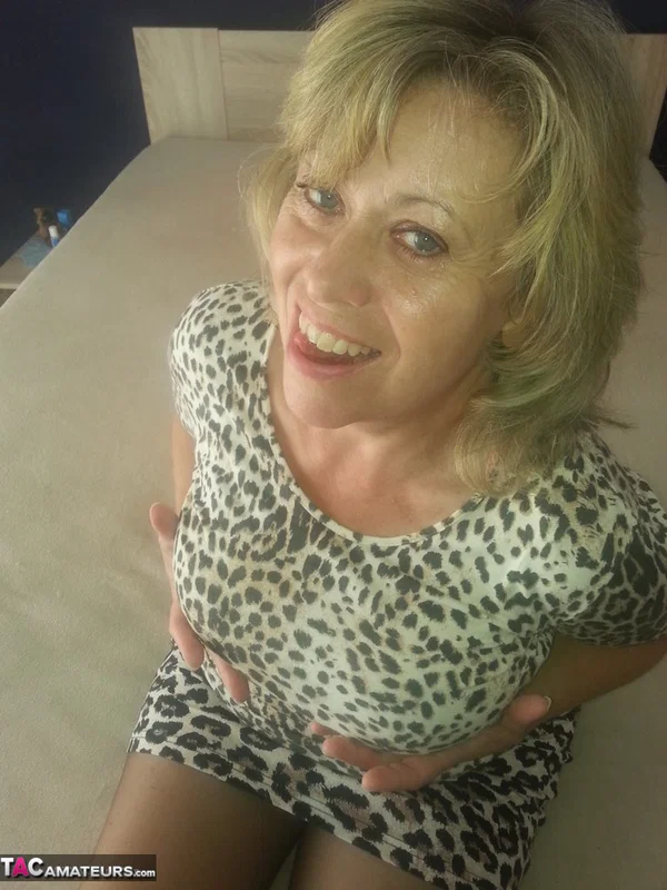 Mature wife Caro frees her fatty big tits & sucks her vibrator before toying  - Mature, BBW, Amateur, Clothed, Big Tits, Skirt, European, Blonde, Chubby, Curvy  - Photo 3
