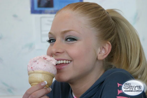 Beautiful young teen amateur Skye Model erotically licking an ice cream cone  - Amateur, Clothed, Face, Teen, Public, Blonde, Babe, Cute, Outdoor, Ass  - Photo 5