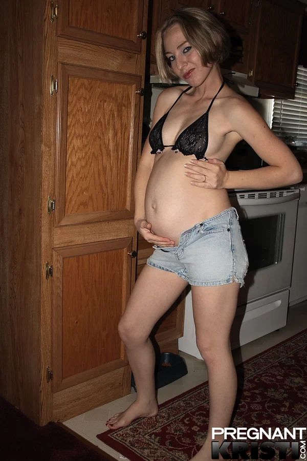 Heavily pregnant girl doffs bikini top and denim shorts to model totally naked  - Pregnant, Amateur, Shorts, Kitchen, Babe, Ass, Tiny Tits, Undressing, Solo, Beautiful  - Photo 3