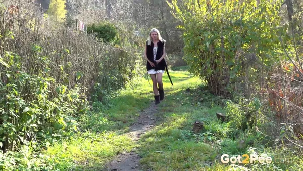 Blonde girl Claudia Macc spreads her pussy lips while taking a pee in nature  - Pissing, Upskirt, Boots, Pussy, Close Up, Outdoor, Spreading, Czech, Skirt, Shaved  - Photo 1