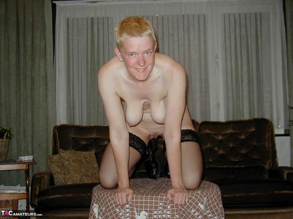 Mature blonde Tiffany Pearl gets naked on a sofa in stockings and black boots  - Mature, Saggy Tits, Chubby, Short Hair, Amateur, Curvy, Boots, BBW, Leather, Thick  - Photo 8