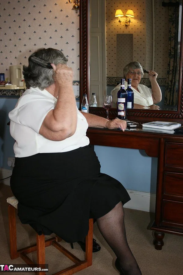 Fat grandmother with short grey hair has phone sex in black stockings only  - Granny, BBW, Amateur, Glasses, Chubby, Stockings, Saggy Tits, Short Hair, Ass, Curvy  - Photo 1